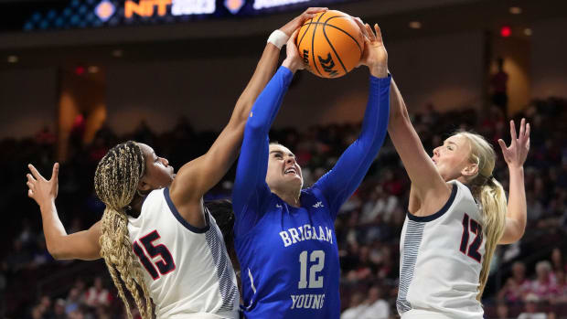March 6, 2023; Las Vegas, NV, USA; Gonzaga Bulldogs forward Yvonne Ejim (15) and forward Eliza Hollingsworth (12) block the shot attempt by BYU Cougars forward Lauren Gustin (12) during the second half in the semifinals of the WCC Basketball Championships at Orleans Arena. Mandatory Credit: Kyle Terada-USA TODAY Sports  