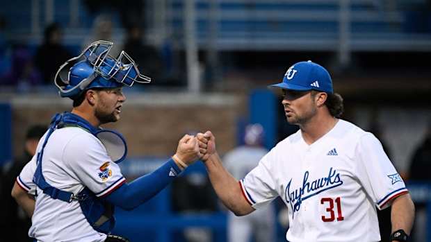 Reese Dutton Fist-Bumping Catcher Jake English