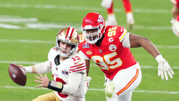 Feb 11, 2024; Paradise, Nevada, USA; San Francisco 49ers quarterback Brock Purdy (13) is pressured by Kansas City Chiefs defensive tackle Chris Jones (95) in the second half in Super Bowl LVIII at Allegiant Stadium. Mandatory Credit: Stephen R. Sylvanie-USA TODAY Sports  