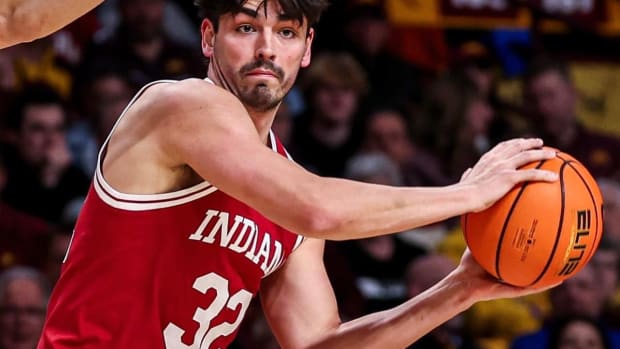 Indiana senior guard Trey Galloway looks to make a pass during the Hoosiers' upset win at Minnesota on Wednesday night. Galloway had 11 assists in the game.