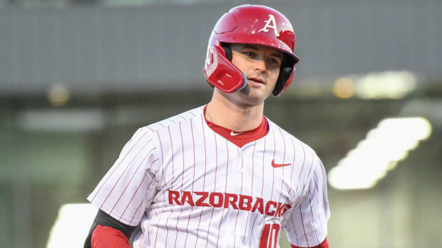 Razorbacks' Peyton Stovall rounds the bases after homer against McNeese State