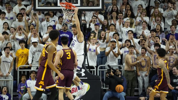 Mar 9, 2024; Evanston, Illinois, USA; Northwestern Wildcats forward Blake Preston (32) dunks the ball against the Minnesota Golden Gophers during the first half at Welsh-Ryan Arena.