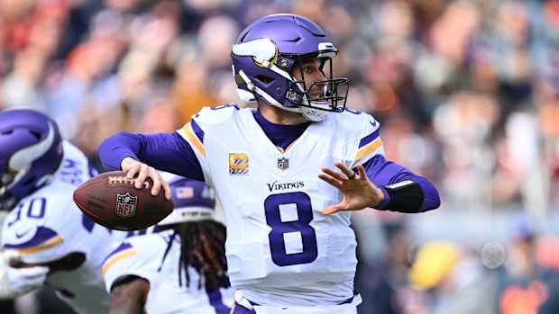 Oct 15, 2023; Chicago, Illinois, USA; Minnesota Vikings quarterback Kirk Cousins (8) passes in the first half against the Chicago Bears at Soldier Field.