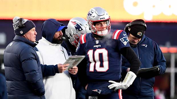 QB Mac Jones with coaches Matt Patricia and Bill Belichick