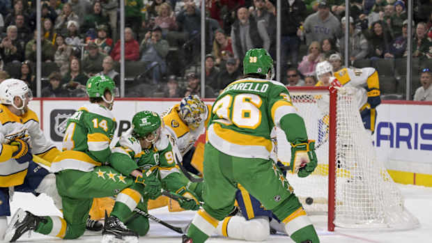 Mar 10, 2024; Saint Paul, Minnesota, USA; Minnesota Wild forward Kirill Kaprizov (97) scores a power play goal against the Nashville Predators during the second period at Xcel Energy Center.