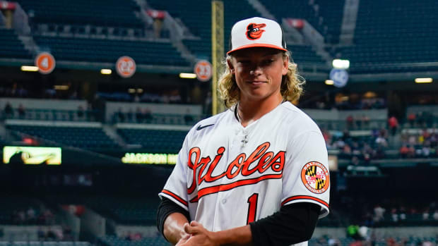 Jul 27, 2022; Baltimore, Maryland, USA; Baltimore Orioles number one draft pick Jackson Holliday looks to the stands while being introduced during third inning of the game against the Tampa Bay Rays at Oriole Park at Camden Yards. Mandatory Credit: Tommy Gilligan-USA TODAY Sports