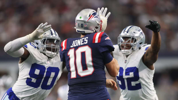 Oct 1, 2023; Arlington, Texas, USA; Dallas Cowboys defensive end DeMarcus Lawrence (90) and defensive end Dorance Armstrong (92) rush New England Patriots quarterback Mac Jones (10) in the second quarter at AT&T Stadium.