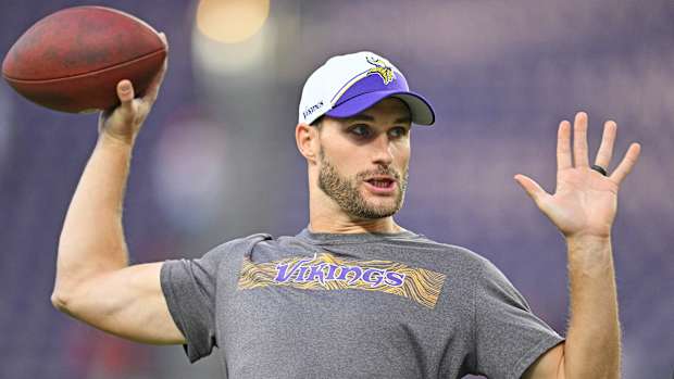 Oct 23, 2023; Minneapolis, Minnesota, USA; Minnesota Vikings quarterback Kirk Cousins (8) warms up before the game against the San Francisco 49ers at U.S. Bank Stadium.