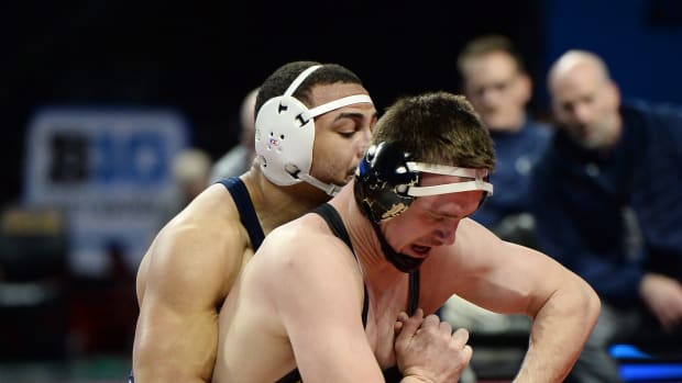 Penn State's Aaron Brooks controls Iowa's Zach Glazier during the 197-pound final at the Big Ten Wrestling Championships. Brooks won by technical fall, 19-3. (Andy Mason/Herald-Mail / USA TODAY NETWORK)