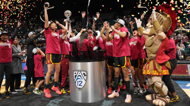 USC players celebrate after the Pac-12 tournament women’s championship game against Stanford.