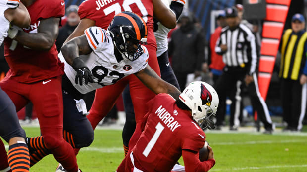 Justin Jones swoops in for a sack of Kyler Murray. Now they'll be teammates.