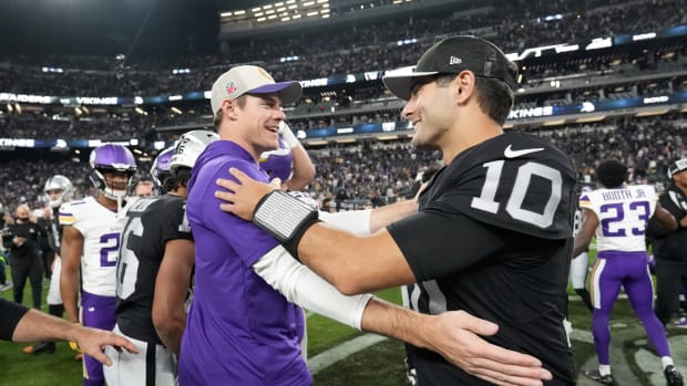 Dec 10, 2023; Paradise, Nevada, USA; Minnesota Vikings coach Kevin O'Connell (left) shakes hands with Las Vegas Raiders quarterback Jimmy Garoppolo (10) after the game at Allegiant Stadium.