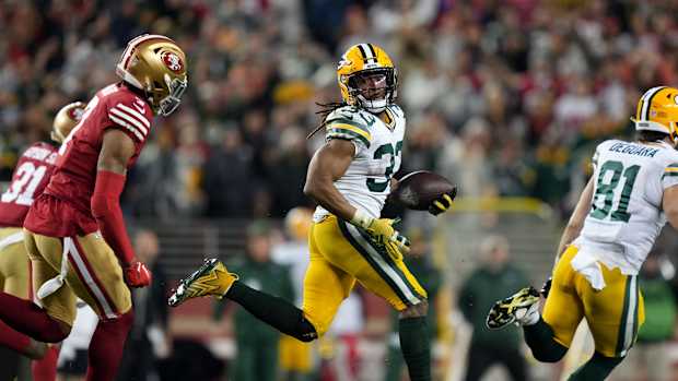January 20, 2024; Santa Clara, CA, USA; Green Bay Packers running back Aaron Jones (33) runs against the San Francisco 49ers during the fourth quarter in a 2024 NFC divisional round game at Levi's Stadium. Mandatory Credit: Kyle Terada-USA TODAY Sports