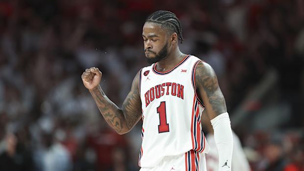 Mar 9, 2024; Houston, Texas, USA; Houston Cougars guard Jamal Shead (1) reacts after a play during the first half against the Kansas Jayhawks at Fertitta Center. 