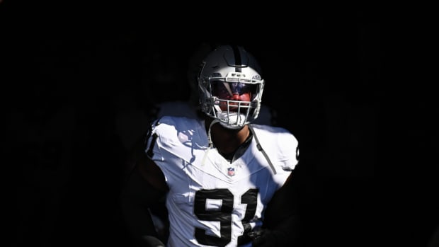 Las Vegas Raiders defensive tackle Bilal Nichols (91) takes the field to warm up before a game against the Chicago Bears at Soldier Field.