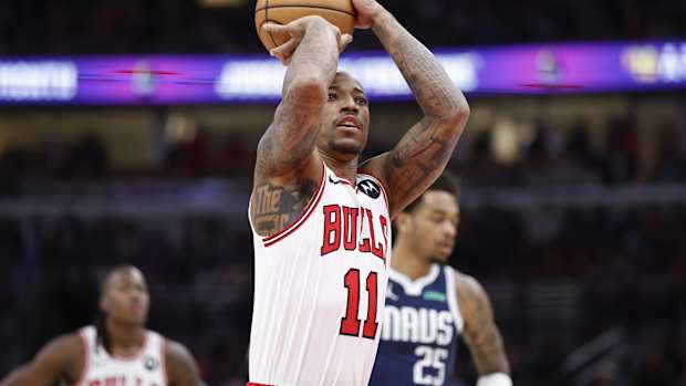 Chicago Bulls forward DeMar DeRozan (11) shoots a free throw against the Dallas Mavericks during the first half at United Center.