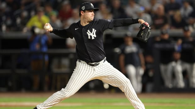 Mar 1, 2024; Tampa, Florida, USA; New York Yankees starting pitcher Gerrit Cole (45) throws a pitch against the Toronto Blue Jays in the first inning at George M. Steinbrenner Field.