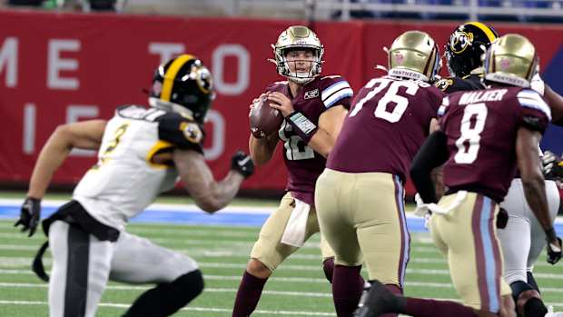 Michigan Panthers starting quarterback Josh Love looks for an open man downfield during the game at Ford Field in Detroit on Saturday, May 13, 2023. The Maulers beat the Panthers, 23-7.  