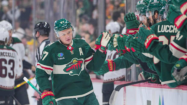 Mar 12, 2024; Saint Paul, Minnesota, USA; Minnesota Wild left wing Kirill Kaprizov (97) celebrates his goal against the Arizona Coyotes in the first period at Xcel Energy Center.