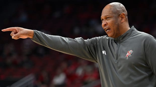Louisville Cardinals coach Kenny Payne calls out instructions during the first half against the Boston College Eagles at KFC Yum! Center.
