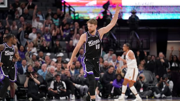 Mar 7, 2024; Sacramento, California, USA; Sacramento Kings forward Domantas Sabonis (10) reacts after making a three point basket against the San Antonio Spurs in the third quarter at the Golden 1 Center. Mandatory Credit: Cary Edmondson-USA TODAY Sports