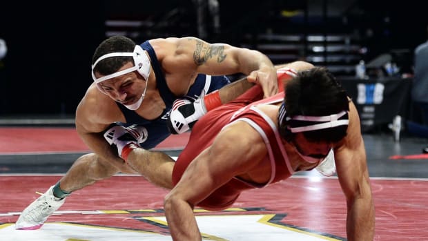 Penn State's Aaron Brooks scores a takedown against Nebraska's Silas Allred in the 2024 Big Ten Wrestling Championships.