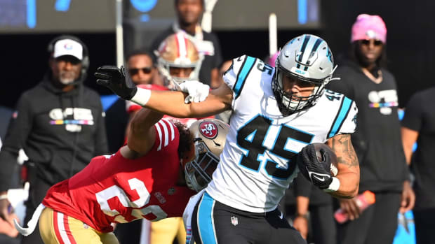 Oct 9, 2022; Charlotte, North Carolina, USA; Carolina Panthers fullback Giovanni Ricci (45) with the ball as San Francisco 49ers safety Talanoa Hufanga (29) defends in the second quarter at Bank of America Stadium. Mandatory Credit: Bob Donnan-USA TODAY Sports