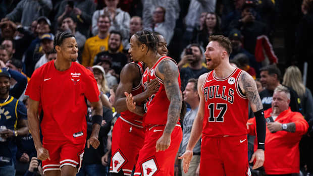 Chicago Bulls forward DeMar DeRozan (11) celebrates with his team his basket to tie the game and go to overtime against the Indiana Pacers at Gainbridge Fieldhouse.