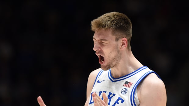 Mar 2, 2024; Durham, North Carolina, USA; Duke Blue Devils center Kyle Filipowski (30) reacts after making a three-point shot during the first half against the Virginia Cavaliers at Cameron Indoor Stadium. Mandatory Credit: Rob Kinnan-USA TODAY Sports