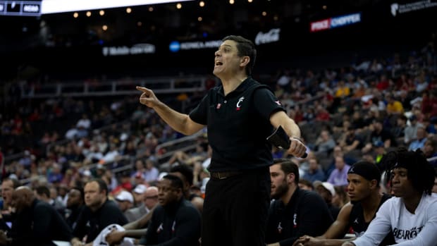 Cincinnati Bearcats head coach Wes Miller coaches in the second half of the Big 12 Conference tournament game between Cincinnati Bearcats and Baylor Bears at T-Mobile Center in Kansas City, Mo., on Thursday, March 14, 2024.