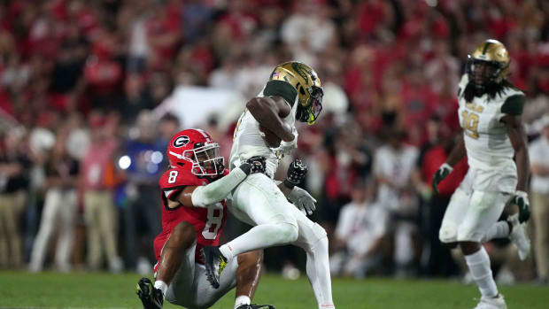Sep 23, 2023; Athens, Georgia, USA; Georgia Bulldogs defensive back Joenel Aguero (8) tackles UAB Blazers receiver Amere Thomas (17) in the second half at Sanford Stadium.