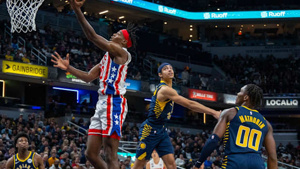  Brooklyn Nets center Day'Ron Sharpe (20) shoots the ball against Indiana Pacers guard Andrew Nembhard (2) i