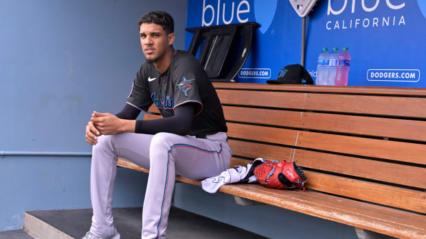 Aug 19, 2023; Los Angeles, California, USA; Miami Marlins starting pitcher Eury Perez (39) waits in the dugout prior to the game against the Los Angeles Dodgers at Dodger Stadium. Mandatory Credit: Jayne Kamin-Oncea-USA TODAY Sports  