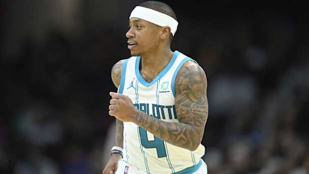 Isaiah Thomas jogs down the court.