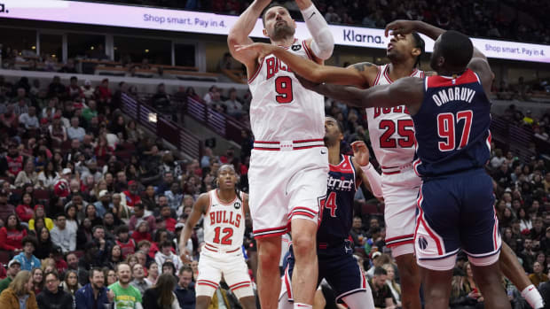 Washington Wizards forward Eugene Omoruyi (97) defends Chicago Bulls center Nikola Vucevic (9) 