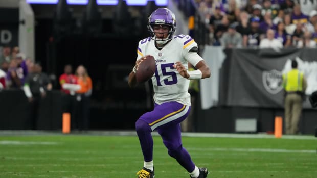Dec 10, 2023; Paradise, Nevada, USA; Minnesota Vikings quarterback Joshua Dobbs (15) throws the ball against the Las Vegas Raiders in the first half at Allegiant Stadium.