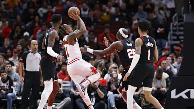  Chicago Bulls forward DeMar DeRozan (11) shoots against the Portland Trail Blazers during the second half at United Center. 