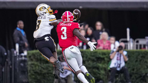 Nov 4, 2023; Athens, Georgia, USA; Georgia Bulldogs defensive back Kamari Lassiter (3) breaks up a pass intended for Missouri Tigers wide receiver Luther Burden III (3) during the second half at Sanford Stadium.