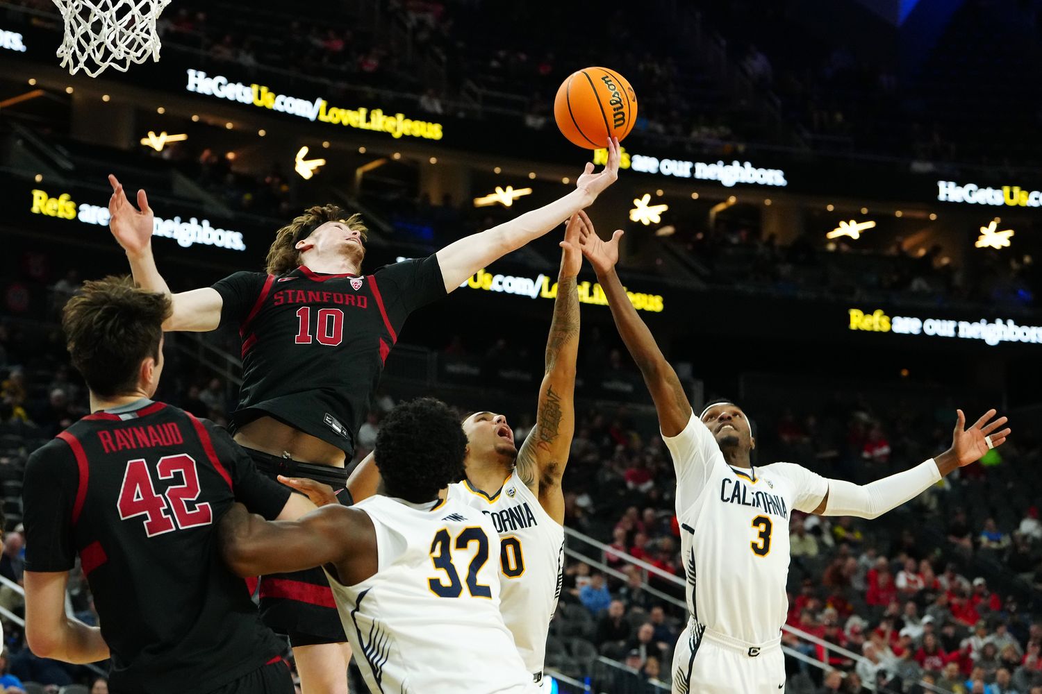 Mar 13, 2024; Las Vegas, NV, USA; Stanford Cardinal forward Max Murrell (10) tips a rebound away from California Golden Bears guard Keonte Kennedy (3) during the second half at T-Mobile Arena. Mandatory Credit: Stephen R. Sylvanie-USA 