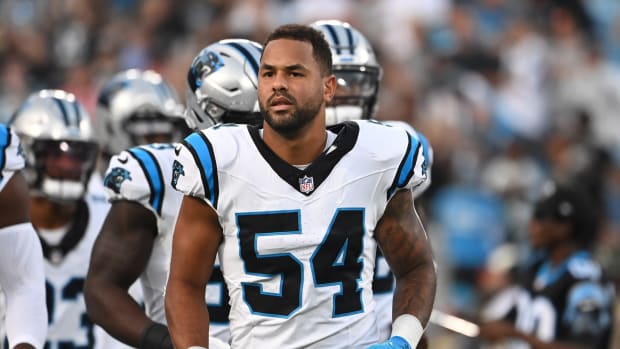Sep 18, 2023; Charlotte, North Carolina, USA; Carolina Panthers linebacker Kamu Grugier-Hill (54) runs on to the field before the game at Bank of America Stadium.