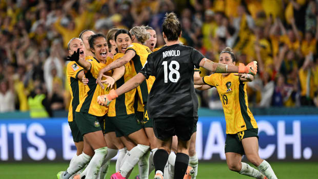 Australia's players pictured celebrating after beating France 7-6 in a penalty shootout in the quarter-finals of the 2023 FIFA Women's World Cup