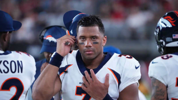 Denver Broncos quarterback Russell Wilson (3) looks on against the Arizona Cardinals at State Farm Stadium.