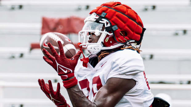Razorbacks' Davion Dozier makes a catch during Saturday's scrimmage