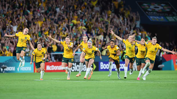 Australia players celebrate after beating France