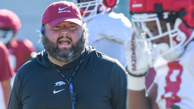Razorbacks offensive line coach Cody Kennedy during drills Tuesday morning