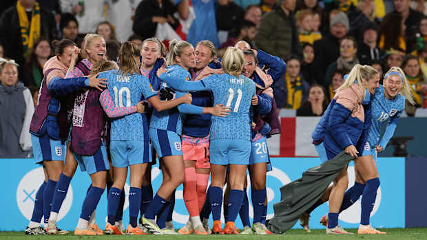 England celebrates a goal against Australia.