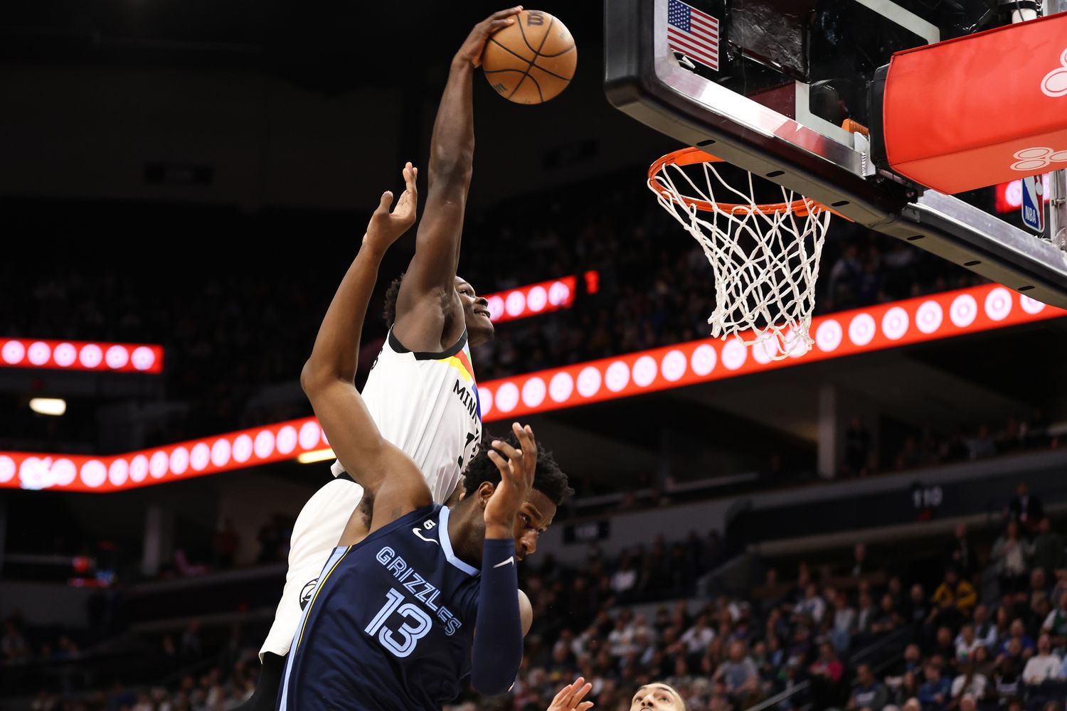 Anthony Edwards of the Timberwolves dunks on Jaren Jackson Jr. of the Grizzlies on Jan. 27, 2023.