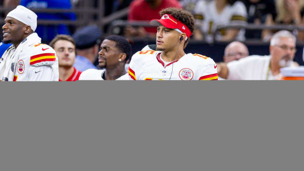 Aug 13, 2023; New Orleans, Louisiana, USA; Kansas City Chiefs quarterback Patrick Mahomes (15) looks on against the New Orleans Saints during the second half at the Caesars Superdome. Mandatory Credit: Stephen Lew-USA TODAY Sports  
