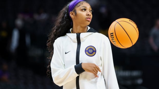 Apr 2, 2023; Dallas, TX, USA; LSU Lady Tigers forward Angel Reese (10) stands on the court during warmups prior to the game against the Iowa Hawkeyes in the final round of the Women's Final Four NCAA tournament at the American Airlines Center. Mandatory Credit: Kevin Jairaj-USA TODAY Sports  