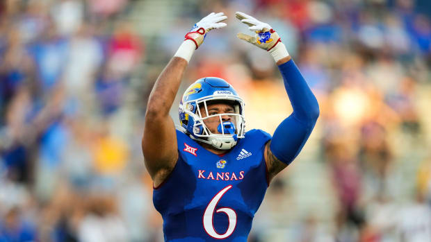 Sep 2, 2022; Lawrence, Kansas, USA; Kansas Jayhawks linebacker Taiwan Berryhill (6) celebrates during the first half against the Tennessee Tech Golden Eagles at David Booth Kansas Memorial Stadium. Mandatory Credit: Jay Biggerstaff-USA TODAY Sports  